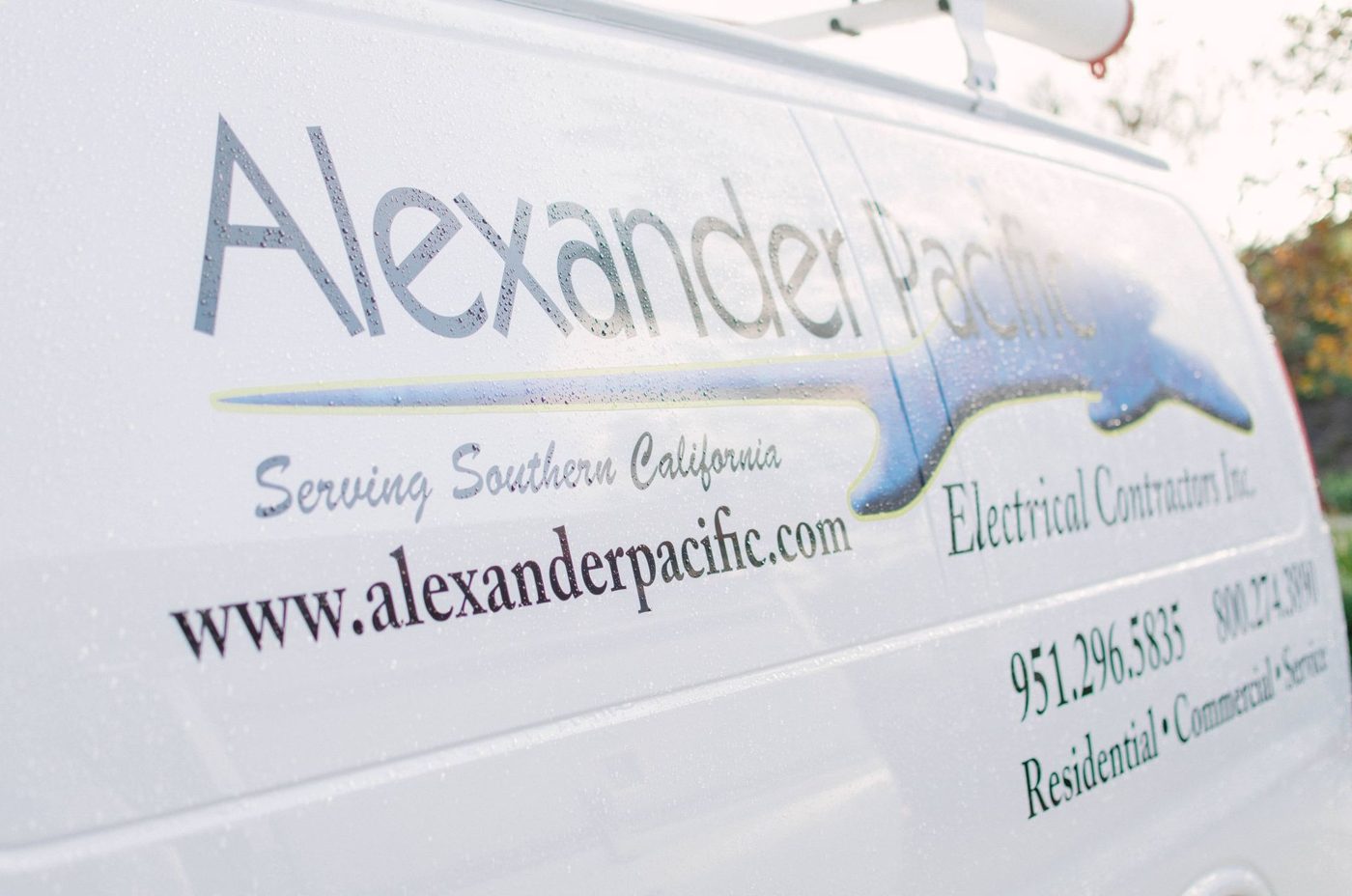 Alexander Pacific Electrical service van with the company name and phone number on its side